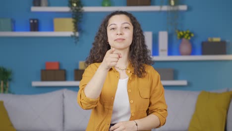 Young-woman-giving-motivational-speech-to-camera.